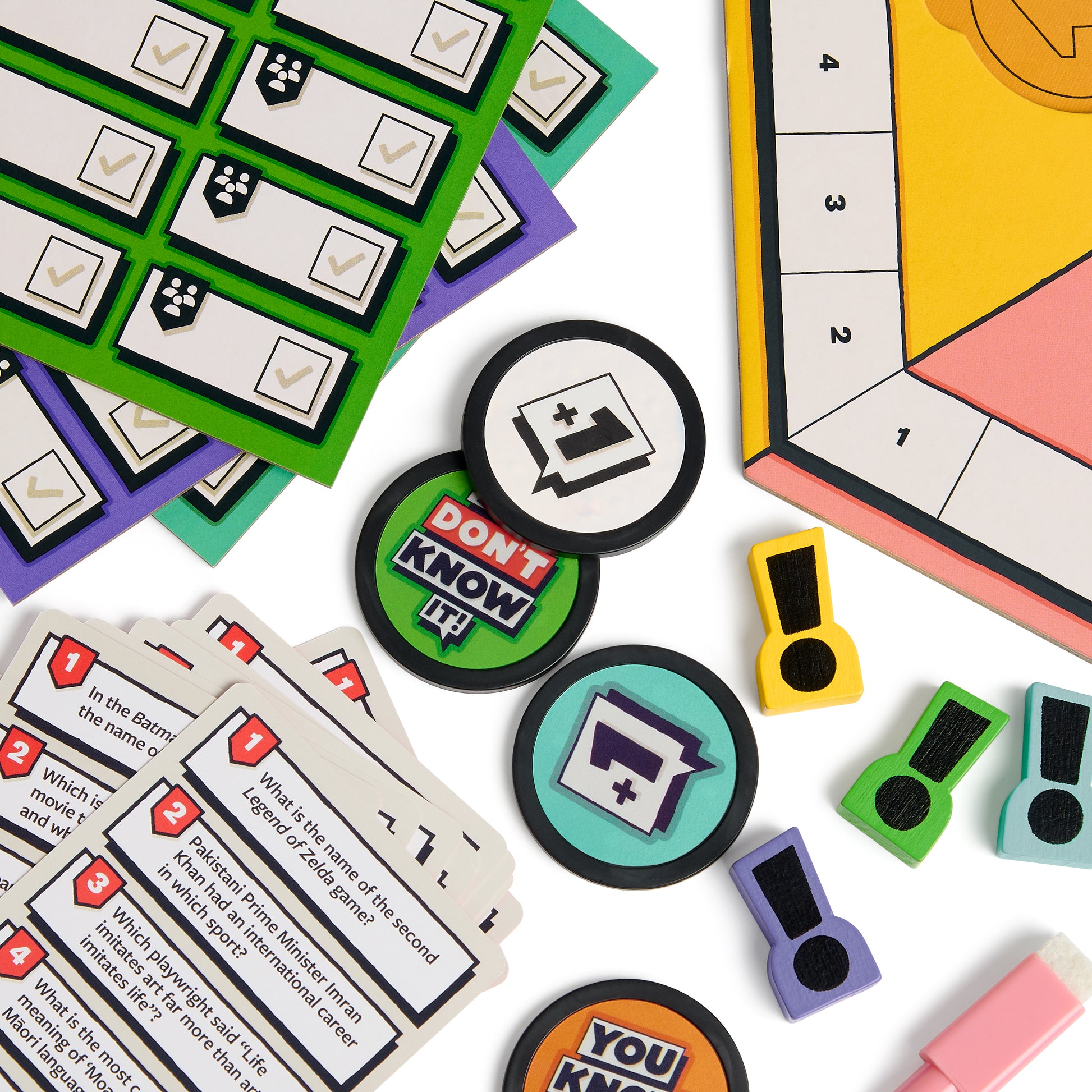 Board game components including cards, tokens, and a board layout on a white background